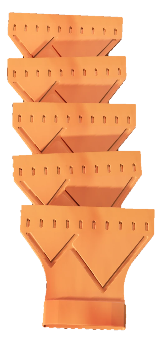 Five replacement blades in Blaze, shingled and seen from above — each one showing the row of serrations along its working edge, the front blade carrying the moulded mountain mark.